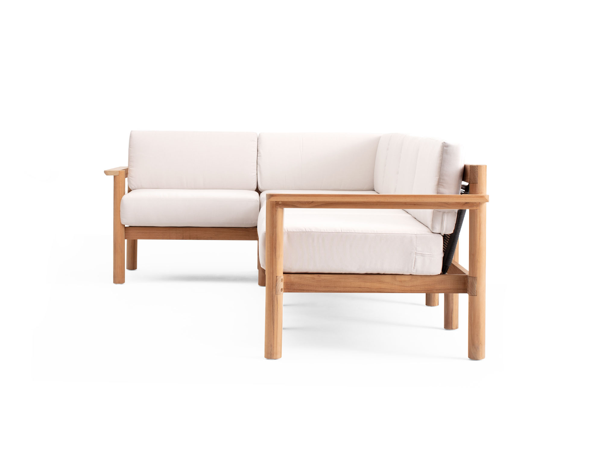 Side view of 4-piece outdoor sectional with white cushions